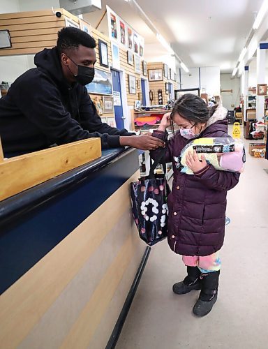 RUTH BONNEVILLE / WINNIPEG FREE PRESS

SUNDAY SPECIAL - MCC Thrift

 
Abudineyo Nkunzimana, a grade 12 immigrant who volunteers as a cashier, helps out seven-year-old Georgia with her purchases of toys while shopping with her mom at Selkirk MCC Furniture and Thrift Shop on Tuesday. 

Story:  For the last half century, thrifts shops associated with Mennonite Central Committee have diverted goods from the waste stream to sell them in their network of thrift shops. This story will follow donations from the back door deliveries to sorting, 

Reporter: Brenda Suderman

Publication date: Sunday, April 24
 
April 12h,  2022
