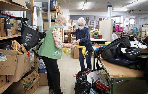 RUTH BONNEVILLE / WINNIPEG FREE PRESS

SUNDAY SPECIAL - MCC Thrift

Volunteers, Marjorie Sawatzky (green) and Cathye Brown tape items together while working at the  Selkirk MCC Furniture and Thrift Shop on Tuesday. 

Story:  For the last half century, thrifts shops associated with Mennonite Central Committee have diverted goods from the waste stream to sell them in their network of thrift shops. This story will follow donations from the back door deliveries to sorting, 

Reporter: Brenda Suderman

Publication date: Sunday, April 24
 
April 12h,  2022
