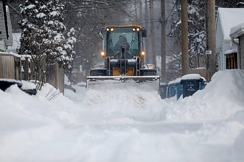 JOHN WOODS / WINNIPEG FREE PRESS
City crews were out clearing snow in a back lane near Grosvenor Friday, April 15, 2022. Winnipeggers were cleaning up after snow was dumped on the city by a late season Colorado Low during the week.

Re: Streilein