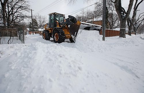 JOHN WOODS / WINNIPEG FREE PRESS
City crews were out clearing snow in a back lane near  Grosvenor Friday, April 15, 2022. Winnipeggers were cleaning up after snow was dumped on the city by a late season Colorado Low during the week.

Re: Streilein