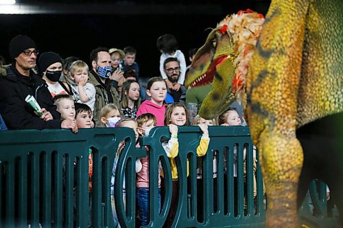 JOHN WOODS / WINNIPEG FREE PRESS
People watch the JoJo Raptor Show during Jurassic Quest at the Convention Centre Friday, April 15, 2022. 

Re: searle