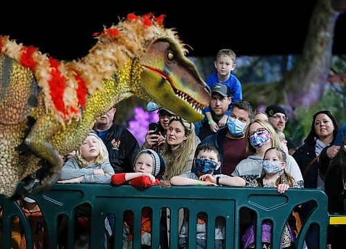 JOHN WOODS / WINNIPEG FREE PRESS
People watch the JoJo Raptor Show during Jurassic Quest at the Convention Centre Friday, April 15, 2022. 

Re: searle