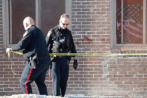 JOHN WOODS / WINNIPEG FREE PRESS
Police tape off blood splatters at a scene outside 737 Sargent at Beverly in Winnipeg Monday, April 18, 2022. 

Re: ?