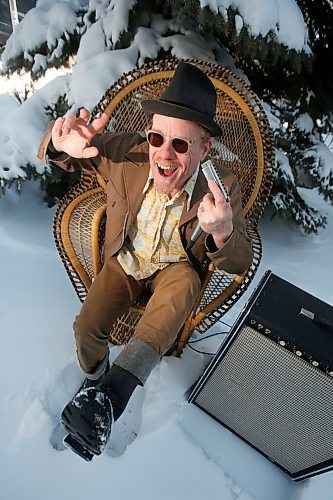 JOHN WOODS / WINNIPEG FREE PRESS
Blues singer and harmonica player Benjamin Darvill, who goes under the performance name Son Of Dave, is photographed outside his home in Winnipeg Monday, April 18, 2022. Darvill has several shows coming up in Winnipeg.

Re: Small