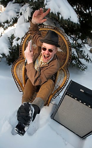 JOHN WOODS / WINNIPEG FREE PRESS
Blues singer and harmonica player Benjamin Darvill, who goes under the performance name Son Of Dave, is photographed outside his home in Winnipeg Monday, April 18, 2022. Darvill has several shows coming up in Winnipeg.

Re: Small