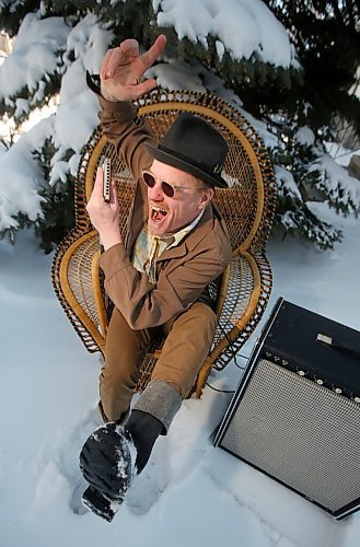 JOHN WOODS / WINNIPEG FREE PRESS
Blues singer and harmonica player Benjamin Darvill, who goes under the performance name Son Of Dave, is photographed outside his home in Winnipeg Monday, April 18, 2022. Darvill has several shows coming up in Winnipeg.

Re: Small