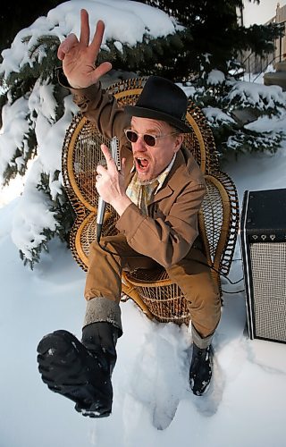 JOHN WOODS / WINNIPEG FREE PRESS
Blues singer and harmonica player Benjamin Darvill, who goes under the performance name Son Of Dave, is photographed outside his home in Winnipeg Monday, April 18, 2022. Darvill has several shows coming up in Winnipeg.

Re: Small