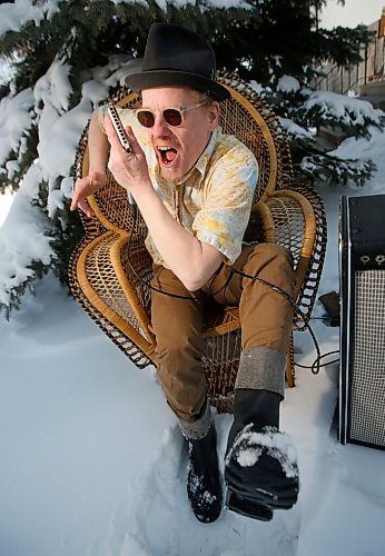 JOHN WOODS / WINNIPEG FREE PRESS
Blues singer and harmonica player Benjamin Darvill, who goes under the performance name Son Of Dave, is photographed outside his home in Winnipeg Monday, April 18, 2022. Darvill has several shows coming up in Winnipeg.

Re: Small