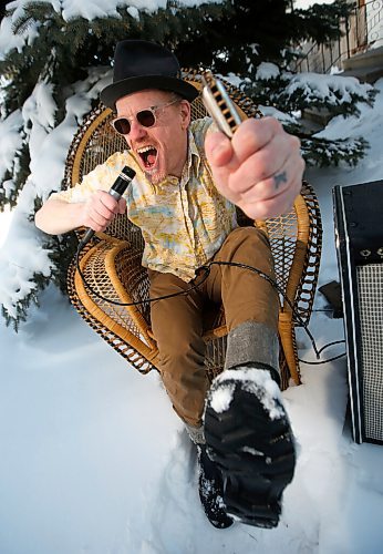 JOHN WOODS / WINNIPEG FREE PRESS
Blues singer and harmonica player Benjamin Darvill, who goes under the performance name Son Of Dave, is photographed outside his home in Winnipeg Monday, April 18, 2022. Darvill has several shows coming up in Winnipeg.

Re: Small