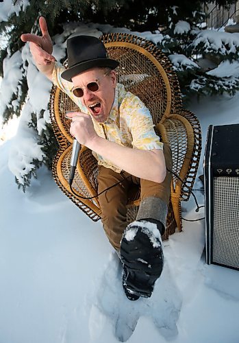 JOHN WOODS / WINNIPEG FREE PRESS
Blues singer and harmonica player Benjamin Darvill, who goes under the performance name Son Of Dave, is photographed outside his home in Winnipeg Monday, April 18, 2022. Darvill has several shows coming up in Winnipeg.

Re: Small