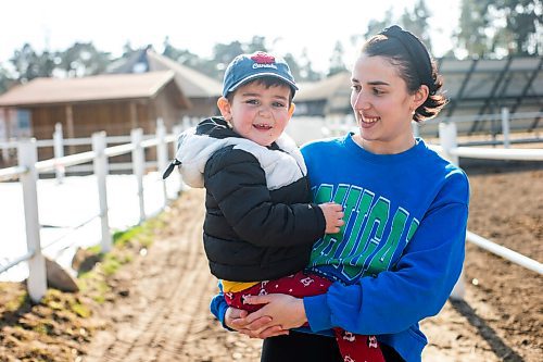 MIKAELA MACKENZIE / WINNIPEG FREE PRESS

Alina Mykholevska and her three-year-old son, Timur Mykholevskiy, on the farm that they're staying just outside of Wrzesnia on Tuesday, April 12, 2022. For Melissa story.
Winnipeg Free Press 2022.