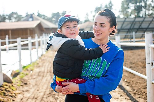 MIKAELA MACKENZIE / WINNIPEG FREE PRESS

Alina Mykholevska and her three-year-old son, Timur Mykholevskiy, on the farm that they're staying just outside of Wrzesnia on Tuesday, April 12, 2022. For Melissa story.
Winnipeg Free Press 2022.