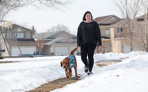 JOHN WOODS / WINNIPEG FREE PRESS
Samantha Schacht walks with her 8 year old golden retriever Lexi in a park close to her home in Winnipeg Tuesday, April 19, 2022. Allegedly, Schacht said she was unable to pay an emergency vet clinics $3500 emergency surgery quote and her dog was confiscated and given to the Humane Society. The Humane Society vet was able to do the surgery for $450 and the dog was given back to her.  

Re: Searle