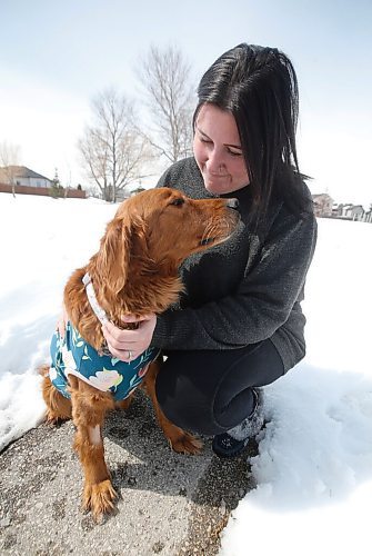 JOHN WOODS / WINNIPEG FREE PRESS
Samantha Schacht cuddles with her 8 year old golden retriever Lexi in a park close to her home in Winnipeg Tuesday, April 19, 2022. Allegedly, Schacht said she was unable to pay an emergency vet clinics $3500 emergency surgery quote and her dog was confiscated and given to the Humane Society. The Humane Society vet was able to do the surgery for $450 and the dog was given back to her.  

Re: Searle