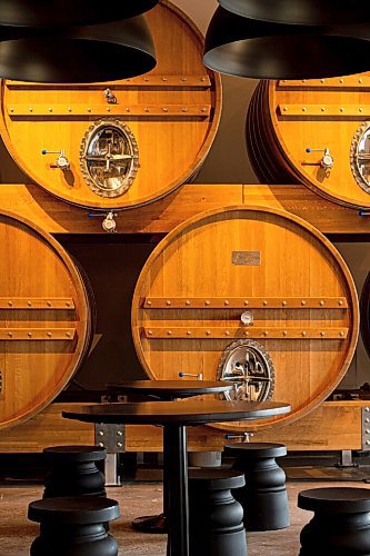 Mike Sudoma/Winnipeg Free Press
Large wooden casks sit in the front of house Low Life Barrel House as decoration amongst customer seating Tuesday afternoon
April 19, 2022