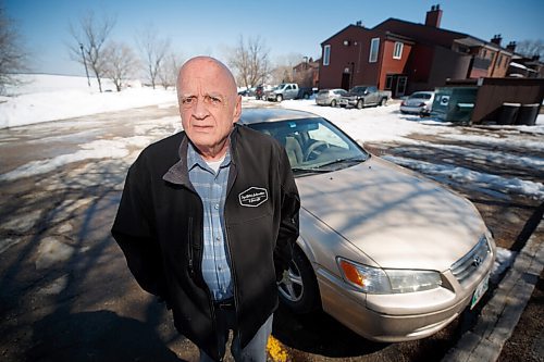MIKE DEAL / WINNIPEG FREE PRESS
Ed Purvis, 75, by his car that was damaged while driving along Ness Avenue. His tire was destroyed and had to be replaced after he drove through a pothole.
See Katlyn Streilein story
220420 - Wednesday, April 20, 2022.