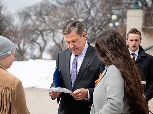 JESSICA LEE / WINNIPEG FREE PRESS

Transportation and Infrastructure Minister Doyle Piwnuik (purple tie) is photographed April 20, 2022 outside the Legislative Building before delivering an announcement on the flooding forecast in Manitoba.

Reporter: Danielle