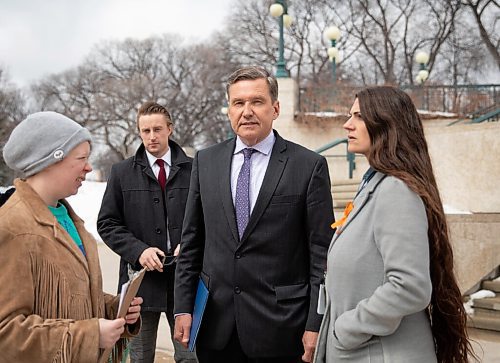 JESSICA LEE / WINNIPEG FREE PRESS

Transportation and Infrastructure Minister Doyle Piwnuik (purple tie) is photographed April 20, 2022 outside the Legislative Building before delivering an announcement on the flooding forecast in Manitoba.

Reporter: Danielle