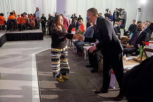 MIKE DEAL / WINNIPEG FREE PRESS
City of Winnipeg Mayor, Brian Bowman, thanks Elder Mary Maytwayashing for her opening prayer during the ceremony.
The Southern Chiefs Organization took posession of the downtown Winnipeg, Hudsons Bay Co. building during a two-hour ceremony Friday morning, which was attended by Prime Minister Trudeau, Manitoba Premier Heather Stefanson, Southern Chiefs Organization Grand Chief, Jerry Daniels, HBC Governor, Richard Baker, Ahmed Hussen, Minister of Housing and Diversity and Inclusion, Patty Hajdu, Minister of Indigenous Services Canada, and Dan Vandal, Minister of Northern Affairs and Minister responsible for Prairies Economic Development Canada. The vacant six-storey building, which opened in 1926 was closed in November 2020.
220422 - Friday, April 22, 2022.