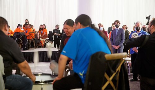 MIKE DEAL / WINNIPEG FREE PRESS
Prime Minister Trudeau watches drum songs being performed during the ceremony.
The Southern Chiefs Organization took posession of the downtown Winnipeg, Hudsons Bay Co. building during a two-hour ceremony Friday morning, which was attended by Prime Minister Trudeau, Manitoba Premier Heather Stefanson, Southern Chiefs Organization Grand Chief, Jerry Daniels, HBC Governor, Richard Baker, Ahmed Hussen, Minister of Housing and Diversity and Inclusion, Patty Hajdu, Minister of Indigenous Services Canada, and Dan Vandal, Minister of Northern Affairs and Minister responsible for Prairies Economic Development Canada. The vacant six-storey building, which opened in 1926 was closed in November 2020.
220422 - Friday, April 22, 2022.