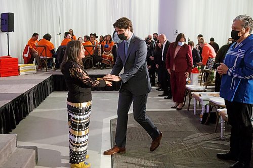 MIKE DEAL / WINNIPEG FREE PRESS
Prime Minister Trudeau thanks Elder Mary Maytwayashing for her opening prayer during the ceremony.
The Southern Chiefs Organization took posession of the downtown Winnipeg, Hudsons Bay Co. building during a two-hour ceremony Friday morning, which was attended by Prime Minister Trudeau, Manitoba Premier Heather Stefanson, Southern Chiefs Organization Grand Chief, Jerry Daniels, HBC Governor, Richard Baker, Ahmed Hussen, Minister of Housing and Diversity and Inclusion, Patty Hajdu, Minister of Indigenous Services Canada, and Dan Vandal, Minister of Northern Affairs and Minister responsible for Prairies Economic Development Canada. The vacant six-storey building, which opened in 1926 was closed in November 2020.
220422 - Friday, April 22, 2022.