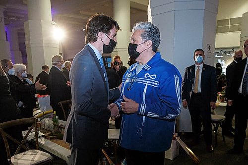 MIKE DEAL / WINNIPEG FREE PRESS
Prime Minister Trudeau takes a minute after the ceremony to chat with Dan Vandal, Minister of Northern Affairs and Minister responsible for Prairies Economic Development Canada.
The Southern Chiefs Organization took posession of the downtown Winnipeg, Hudsons Bay Co. building during a two-hour ceremony Friday morning, which was attended by Prime Minister Trudeau, Manitoba Premier Heather Stefanson, Southern Chiefs Organization Grand Chief, Jerry Daniels, HBC Governor, Richard Baker, Ahmed Hussen, Minister of Housing and Diversity and Inclusion, Patty Hajdu, Minister of Indigenous Services Canada, and Dan Vandal, Minister of Northern Affairs and Minister responsible for Prairies Economic Development Canada. The vacant six-storey building, which opened in 1926 was closed in November 2020.
220422 - Friday, April 22, 2022.