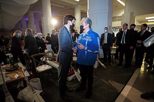 MIKE DEAL / WINNIPEG FREE PRESS
Prime Minister Trudeau takes a minute after the ceremony to chat with Dan Vandal, Minister of Northern Affairs and Minister responsible for Prairies Economic Development Canada.
The Southern Chiefs Organization took posession of the downtown Winnipeg, Hudsons Bay Co. building during a two-hour ceremony Friday morning, which was attended by Prime Minister Trudeau, Manitoba Premier Heather Stefanson, Southern Chiefs Organization Grand Chief, Jerry Daniels, HBC Governor, Richard Baker, Ahmed Hussen, Minister of Housing and Diversity and Inclusion, Patty Hajdu, Minister of Indigenous Services Canada, and Dan Vandal, Minister of Northern Affairs and Minister responsible for Prairies Economic Development Canada. The vacant six-storey building, which opened in 1926 was closed in November 2020.
220422 - Friday, April 22, 2022.