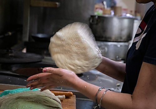 JESSICA LEE / WINNIPEG FREE PRESS

A worker prepares naan at Barbeque Hut, Winnipegs first Pakistani restaurant, on April 22, 2022.

Reporter: Dave