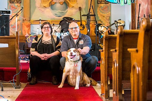 MIKAELA MACKENZIE / WINNIPEG FREE PRESS

Andy Vaile (left), Kelly Hughes, and dog Zoey (who is adoptable through Manitoba Great Pyrenees Rescue) pose for a portrait in the Valiant Theatre space, which is in a church at the corner of Logan Avenue and Fountain Street, in Winnipeg on Tuesday, April 26, 2022. For Janine LeGal story.
Winnipeg Free Press 2022.