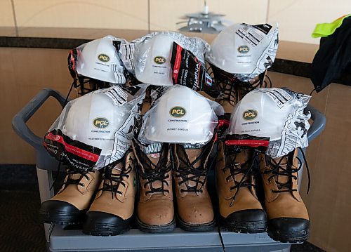JESSICA LEE / WINNIPEG FREE PRESS

Boots and hard hats are photographed at The Asper Centre at St. Boniface Hospital during a media announcement on April 26, 2022.

Reporter: Carol