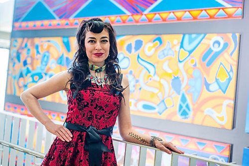 MIKAELA MACKENZIE / WINNIPEG FREE PRESS

Indigenous artist Kristin Flattery poses for a portrait at the unveiling of her art at the Active Living Centre at the University of Manitoba in Winnipeg on Tuesday, April 26, 2022.
Winnipeg Free Press 2022.