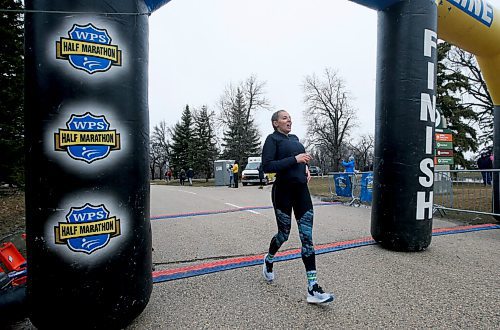 JOHN WOODS / WINNIPEG FREE PRESS
Jessica Wylychenko, first woman across the line, crosses the finish at the Winnipeg Police Service (WPS) Half Marathon in Assiniboine Park Sunday, May 1, 2022. Proceeds go to the Canadian Cancer Society.

Re: Searle