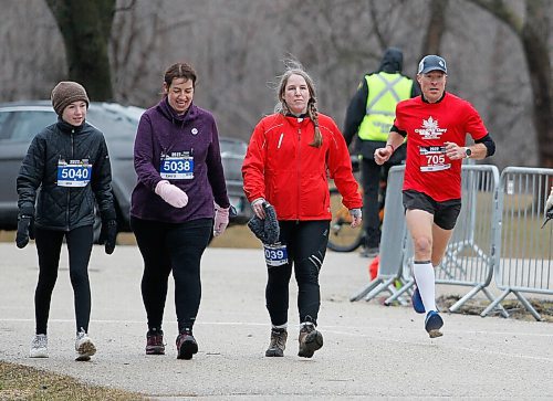 JOHN WOODS / WINNIPEG FREE PRESS
John Coffin, right, crosses the line first at the Winnipeg Police Service (WPS) Half Marathon in Assiniboine Park Sunday, May 1, 2022. Proceeds go to the Canadian Cancer Society.

Re: Searle