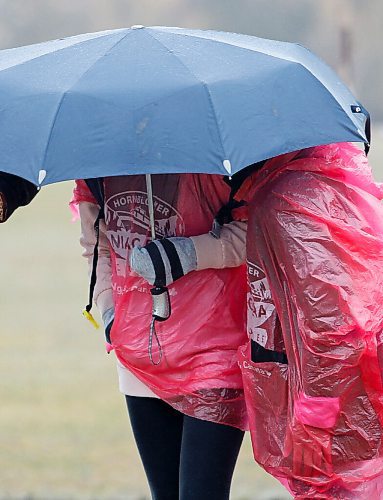 JOHN WOODS / WINNIPEG FREE PRESS
Supporters take shelter from the rain at the Winnipeg Police Service (WPS) Half Marathon in Assiniboine Park Sunday, May 1, 2022. Proceeds go to the Canadian Cancer Society.

Re: Searle