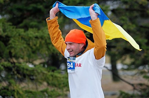 JOHN WOODS / WINNIPEG FREE PRESS
Ilya, from Russia, carries a Ukraine flag over the finish line at the Winnipeg Police Service (WPS) Half Marathon in Assiniboine Park Sunday, May 1, 2022. Proceeds go to the Canadian Cancer Society.

Re: Searle