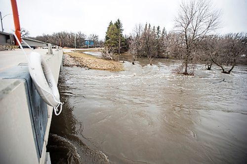 MIKAELA MACKENZIE / WINNIPEG FREE PRESS

Sturgeon Creek rushes under the Woodhaven Bridge in Winnipeg on Monday, May 2, 2022.
Winnipeg Free Press 2022.