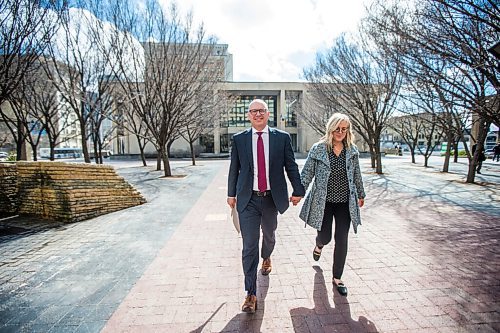 MIKAELA MACKENZIE / WINNIPEG FREE PRESS

Scott Gillingham walks to the clerk's office with his wife, Marla, to register for the mayoral race at City Hall in Winnipeg on Monday, May 2, 2022. For Joyanne story.
Winnipeg Free Press 2022.