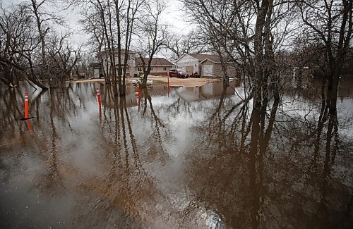 JOHN WOODS / WINNIPEG FREE PRESS
A home has put down some sandbags in response to high water in Elie, MB Monday, May 2, 2022. The combination of a high La Salle River and field runoff has resulted in high water levels throughout town.

Re: ?