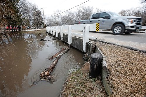 JOHN WOODS / WINNIPEG FREE PRESS
A truck crosses a high La Salle River in Elie, MB Monday, May 2, 2022. The combination of a high La Salle River and field runoff has resulted in high water levels throughout town.

Re: ?