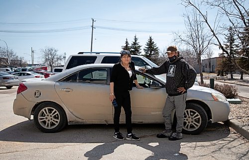 JESSICA LEE / WINNIPEG FREE PRESS

Peguis flood evacuees Christopher Sinclair (right) and Arlene Spence are photographed at the Westin Hotel on May 3, 2022 with their car. They were given a place to stay in Gimli but drove down to the Westin to check up on family who were staying there.

Reporter: Erik Pindera