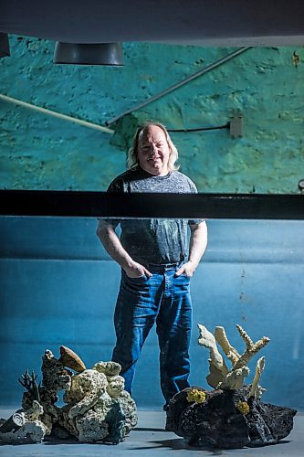 MIKAELA MACKENZIE / WINNIPEG FREE PRESS

Rick Banack, owner of Environmental Aquatic Services, poses for a portrait in the empty 5,000-gallon tank in his space in Winnipeg on Tuesday, May 3, 2022. For Dave Sanderson story.
Winnipeg Free Press 2022.
