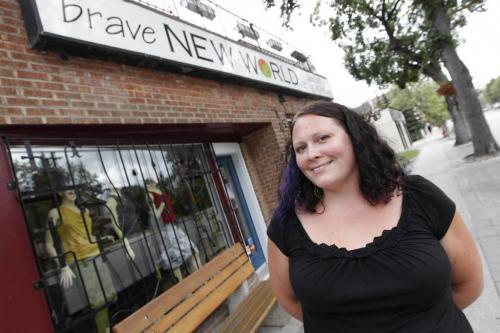 BORIS.MINKEVICH@FREEPRESS.MB.CA  100823 BORIS MINKEVICH / WINNIPEG FREE PRESS Brave New World owner Leah McCormick posdes in front of her Sherbrook business.