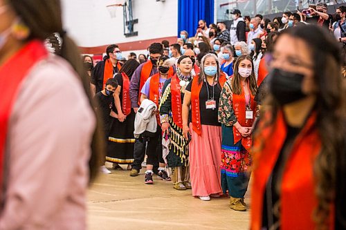 MIKAELA MACKENZIE / WINNIPEG FREE PRESS

RRC Polytech graduates walk out during the grand entry at the RRC graduation Pow Wow in Winnipeg on Friday, May 6, 2022. For Malak Abas story.
Winnipeg Free Press 2022.