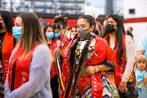 MIKAELA MACKENZIE / WINNIPEG FREE PRESS

RRC Polytech graduate Cheryl Baraniuk dances out during the grand entry at the RRC graduation Pow Wow in Winnipeg on Friday, May 6, 2022. For Malak Abas story.
Winnipeg Free Press 2022.