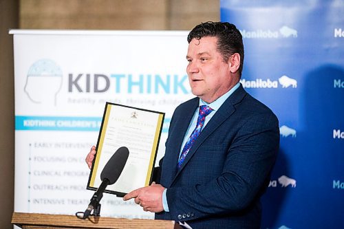 MIKAELA MACKENZIE / WINNIPEG FREE PRESS

James Teitsma, MLA for Radisson, holds the proclamation announcing Child and Youth Mental Health Day at the Manitoba Legislative Building in Winnipeg on Friday, May 6, 2022. For Katie May story.
Winnipeg Free Press 2022.