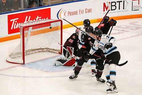 Daniel Crump / Winnipeg Free Press. Winnipeg Ice Connor McClennon (94) scores 18 seconds into the opening frame to put the Ice up early against the Moosejaw Warriors in game one of their second round playoff series. May 6, 2022.