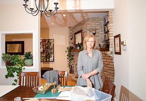 JESSICA LEE / WINNIPEG FREE PRESS

Deb Frances, a book artist, poses for a photo in her dining room with her materials on May 9, 2022.

Reporter: Brenda Suderman

