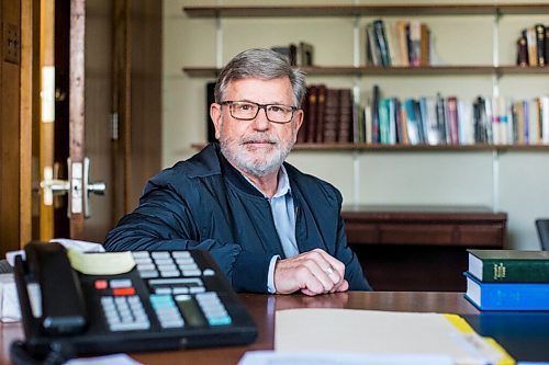 MIKAELA MACKENZIE / WINNIPEG FREE PRESS

Andrew Thomson, the Rectors Warden, poses for a portrait with the phone in the Rector's office at St. Georges Anglican Church (which is completely without MTS phone service right now) in Winnipeg on Tuesday, May 10, 2022. For Kevin story.
Winnipeg Free Press 2022.