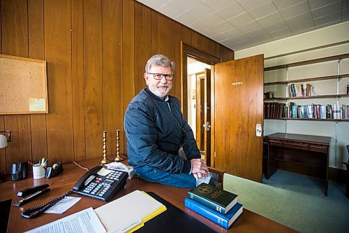 MIKAELA MACKENZIE / WINNIPEG FREE PRESS

Andrew Thomson, the Rectors Warden, poses for a portrait with the phone in the Rector's office at St. Georges Anglican Church (which is completely without MTS phone service right now) in Winnipeg on Tuesday, May 10, 2022. For Kevin story.
Winnipeg Free Press 2022.