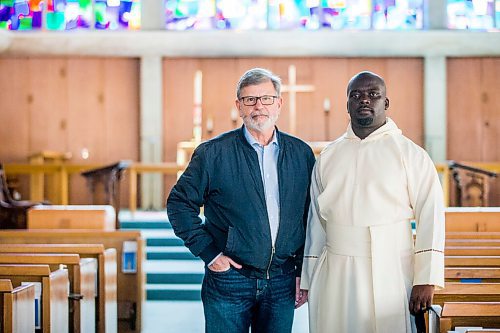 MIKAELA MACKENZIE / WINNIPEG FREE PRESS

Andrew Thomson, the Rectors Warden (left), and Sherpard Gwende, the Reverend Father, pose for a portrait at St Georges Anglican Church (which is completely without MTS phone service right now) in Winnipeg on Tuesday, May 10, 2022. For Kevin story.
Winnipeg Free Press 2022.